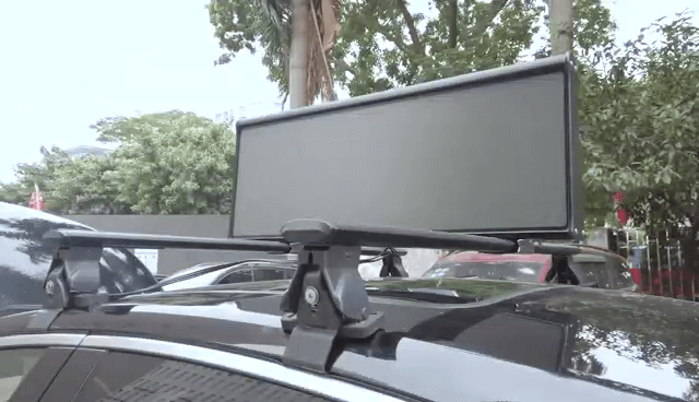 Rooftop LED panel active in real traffic